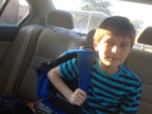 Dropping off my son at school, as he gets set to head to the playground for some early recess time.