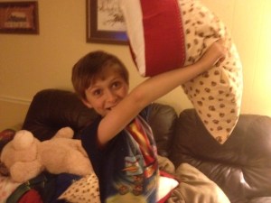My son, always dangerous when armed with a pillow.