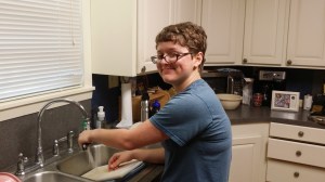 We found the female cub using her skills to wash away the remnants of the night's kill.